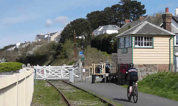 Cyclist on the Tarka Trail by the Signal Box at Instow